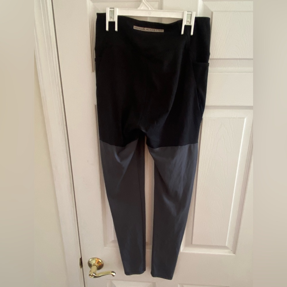 Black and gray Nikki Blackketter x Gymshark leggings